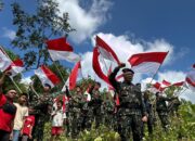 Brimob- Kodim 1407/ Bone Kompak Kibarkan Bendera Merah Putih di Puncak Gunung Lampoko